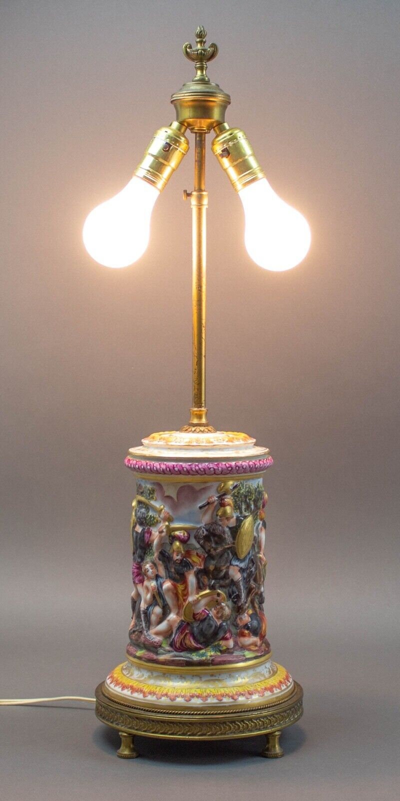 Capodimonte Porcelain Decorated Relief Warriors In Battle Lamp With Bronze Base