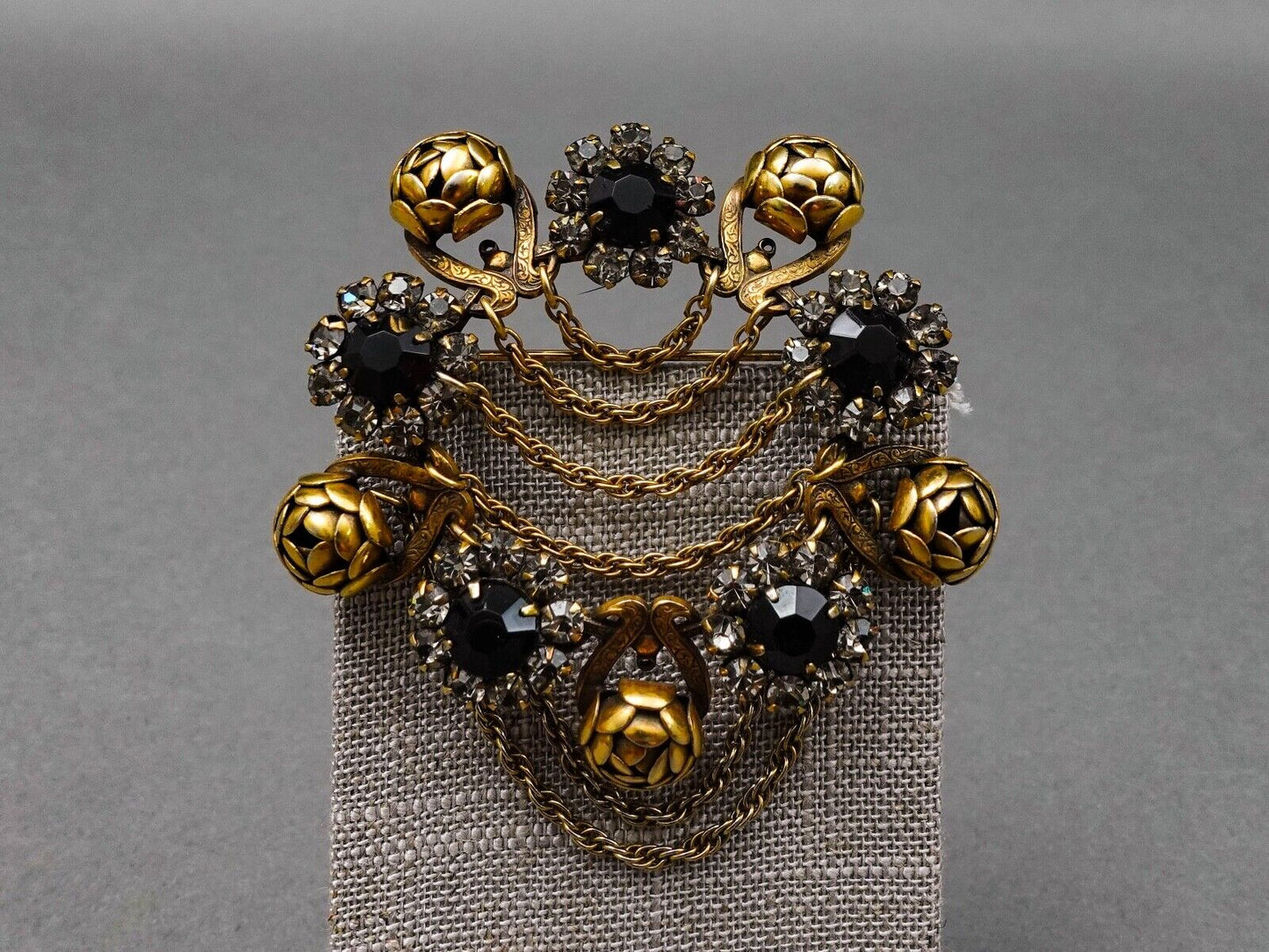 Sandor Signed Vintage Floral Gold Tone Black Rhinestones Dangle Chain Brooch Pin