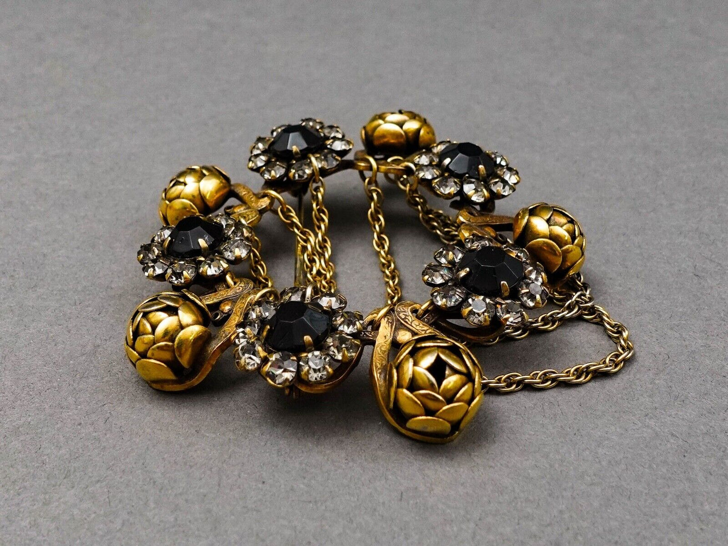 Sandor Signed Vintage Floral Gold Tone Black Rhinestones Dangle Chain Brooch Pin